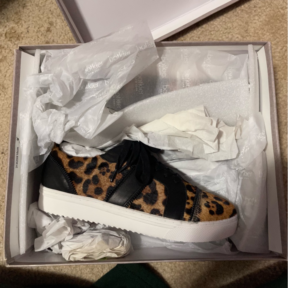 Unworn leopard print sneakers